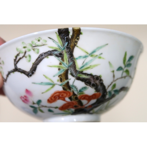 583 - Chinese shallow bowl painted with a tree in blossom, signed with six character mark to base, 16cm di... 