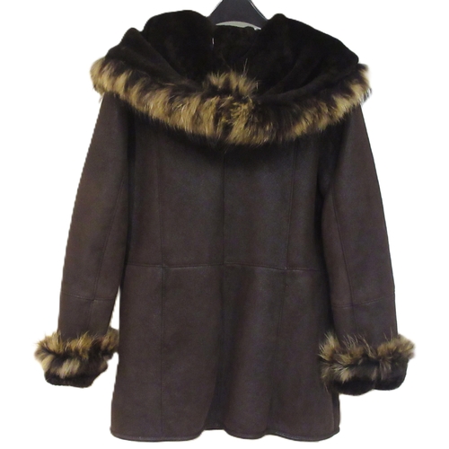 69 - Good quality ladies fur lined and fur trimmed coat with hood, size XL