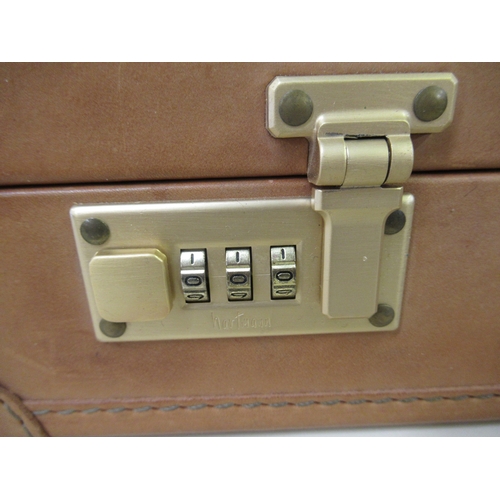 73 - 20th Century tan leather Hartmann briefcase with original labels and tags