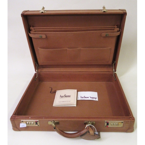 73 - 20th Century tan leather Hartmann briefcase with original labels and tags