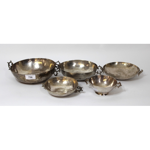 756 - Group of five Continental white metal two handled cups, 34oz t