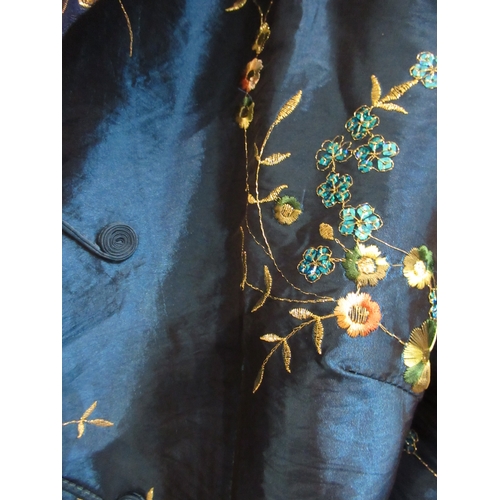 76 - Floral embroidered and sequin mounted silk jacket by Tang Yi, labelled size XXXL, and a floral embro... 