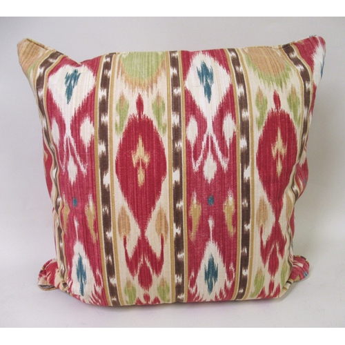 86 - Four late 20th Century feather filled Kelim style cushions, 21ins square