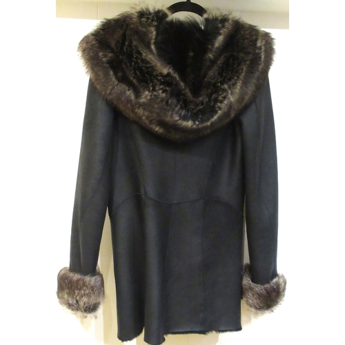 98 - Ladies hooded sheepskin coat