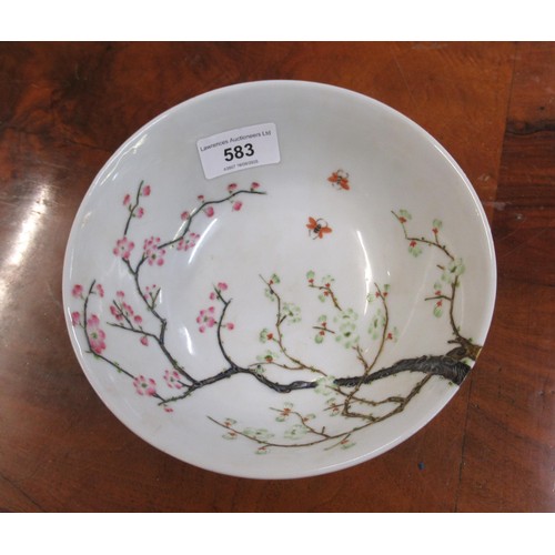 583 - Chinese shallow bowl painted with a tree in blossom, signed with six character mark to base, 16cm di... 