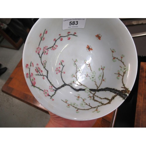 583 - Chinese shallow bowl painted with a tree in blossom, signed with six character mark to base, 16cm di... 