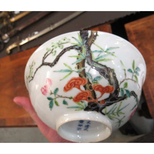 583 - Chinese shallow bowl painted with a tree in blossom, signed with six character mark to base, 16cm di... 