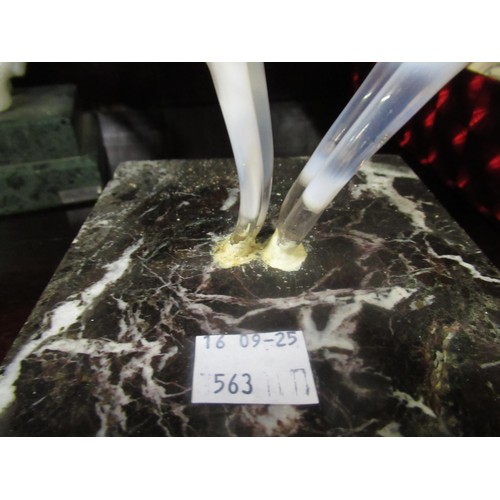 563 - Istvan Komaromy, opaque glass figure of a girl dancer on a ball form base, 20cm high, together with ... 