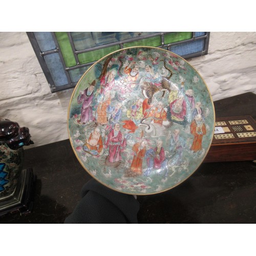 585 - Chinese circular shallow bowl painted with figures and animals, 22cm diameter, with seal mark to bas... 