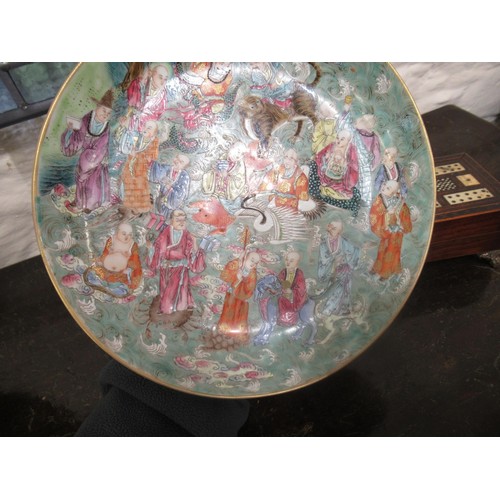 585 - Chinese circular shallow bowl painted with figures and animals, 22cm diameter, with seal mark to bas... 