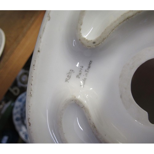 515B - Alfred Meakin transfer plate decorated with figures and dogs, together with a French Robj oil lamp i... 