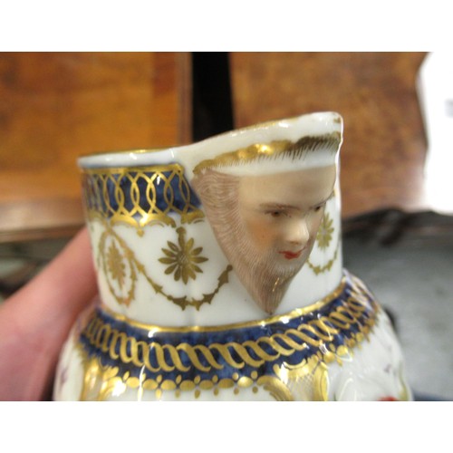 597 - Antique Samson Worcester jug having gilded and floral bird swag decoration with mask head spout bear... 