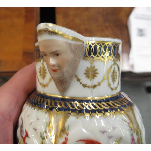 597 - Antique Samson Worcester jug having gilded and floral bird swag decoration with mask head spout bear... 