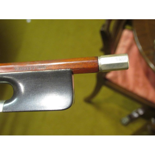 198 - Case containing a collection of six various violin bows including one signed Arnold, Paris