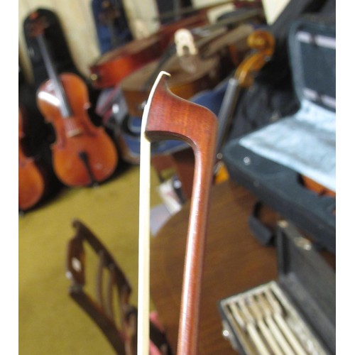 198 - Case containing a collection of six various violin bows including one signed Arnold, Paris