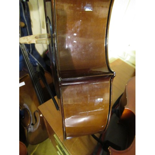 191 - Two student's half size cellos in soft cases