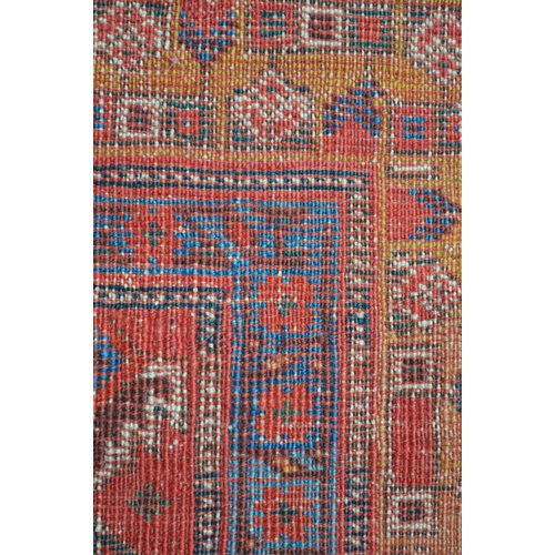 14 - Antique South West Persian rug with a lobed medallion and stylised Herati design on a red ground wit... 
