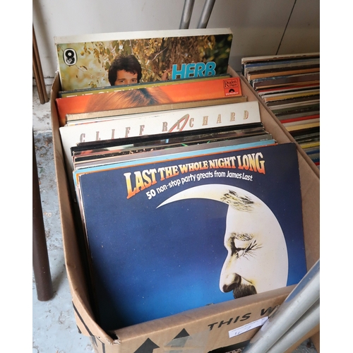 47 - Four boxes containing a large collection of various 20th Century records, including various LPs and ... 