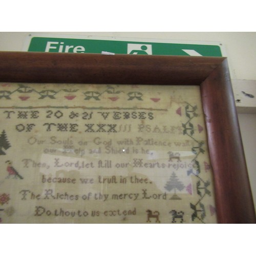 28 - George III needlework sampler, worked with verses 20 and 21 of the 33rd Psalm, within a floral and s... 