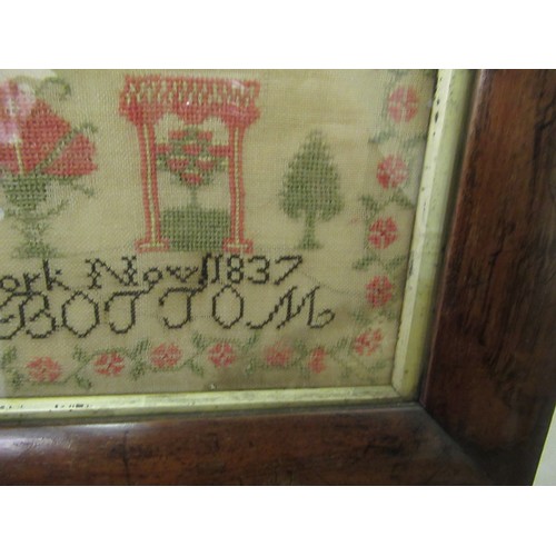 33 - Early Victorian needlepoint sampler worked with a memorial poem, stylised flowers and buildings, sig... 
