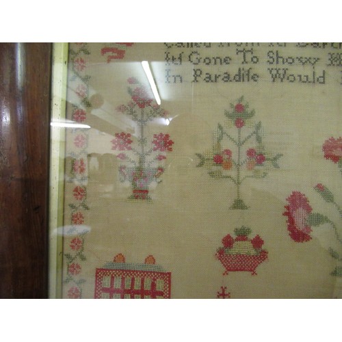 33 - Early Victorian needlepoint sampler worked with a memorial poem, stylised flowers and buildings, sig... 