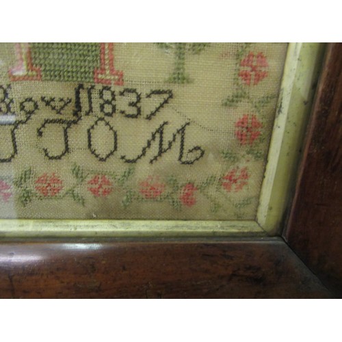 33 - Early Victorian needlepoint sampler worked with a memorial poem, stylised flowers and buildings, sig... 