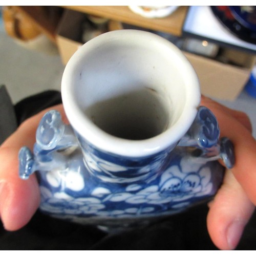 477 - Pair of small 19th Century Chinese blue and white prunus blossom moon flasks, each with a four chara... 