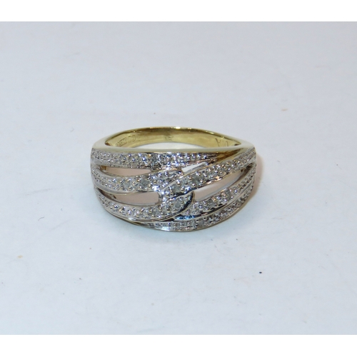 1136 - 9ct Yellow gold diamond dress ring of interlocking bands, size N, 3.6g