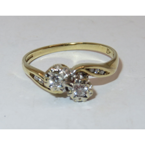 1142 - 9ct Gold diamond crossover ring, size N, 2g