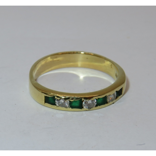 1159 - 14ct Yellow gold nine stone emerald and diamond half eternity ring, size 'N', 2.7g