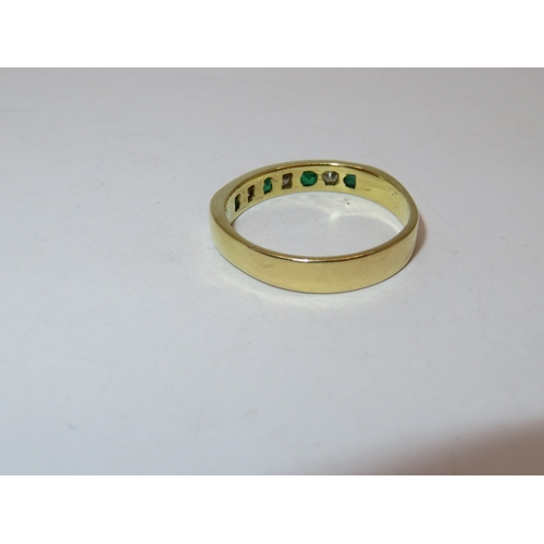 1160 - 18ct Yellow gold seven stone emerald and diamond half eternity ring, size 'S', 4.4g