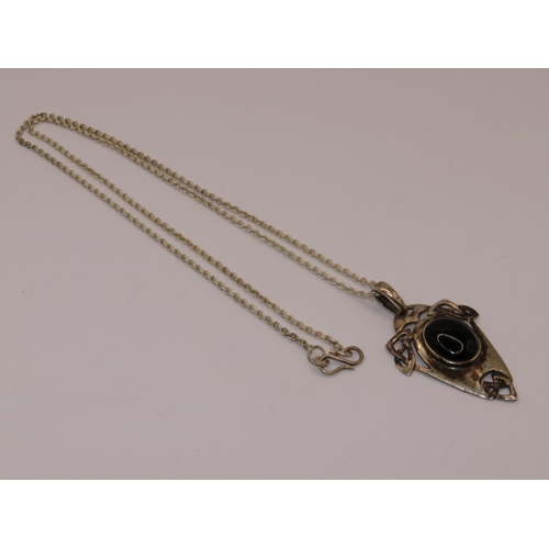 1191 - Arts & Crafts silver and black onyx pendant on a later silver chain