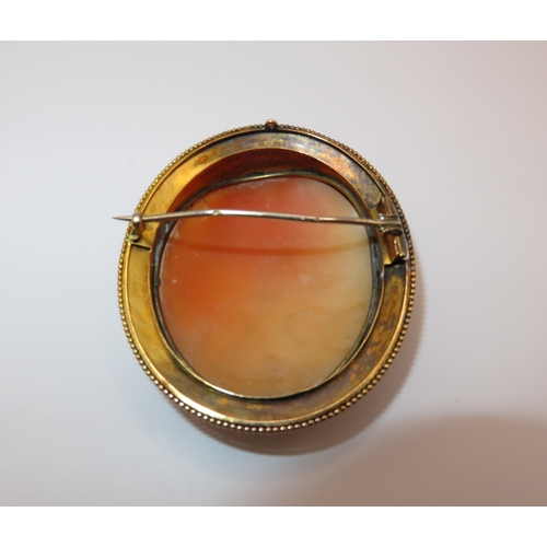 1218 - 19th Century high carat gold mounted oval carved shell cameo brooch depicting Hebe, gross weight 22.... 