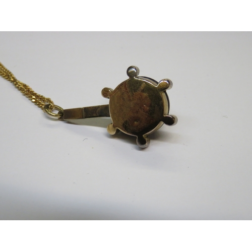 1250D - Unmarked yellow metal lapis lazuli and rose cut diamond set pendant on 9ct Gold chain, the chain 2.5... 