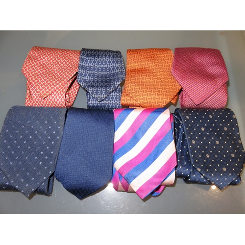 162 - Four Hermes silk ties, together with three others Salvatore Feragamo, Cadogan and Armani
