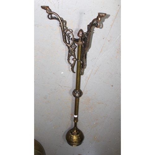 1696 - Black painted wrought iron triple section fire screen together with a brass telescopic standard lamp... 