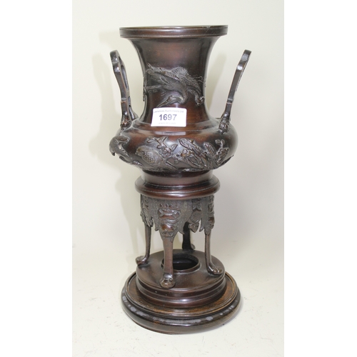 1697 - Late 19th Century Japanese dark patinated bronze two handled vase decorated in high relief with bird... 