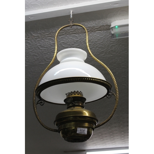 1737 - Early 20th Century brass hanging oil lamp with opaque glass shade, 52cm high, together with a pair o... 