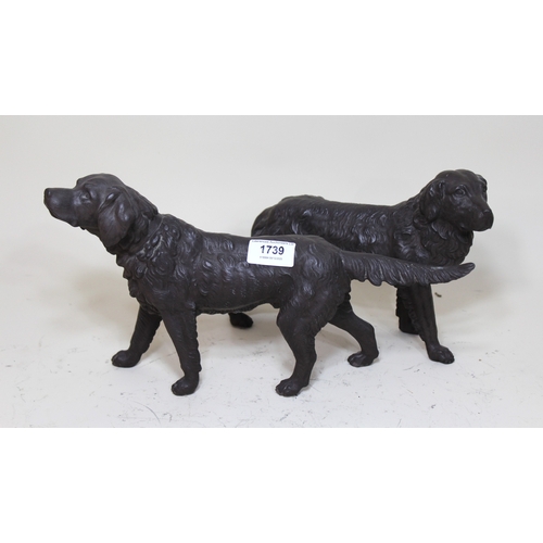 1739 - Pair of dark patinated cast alloy figures of gun dogs, the largest 33cm wide