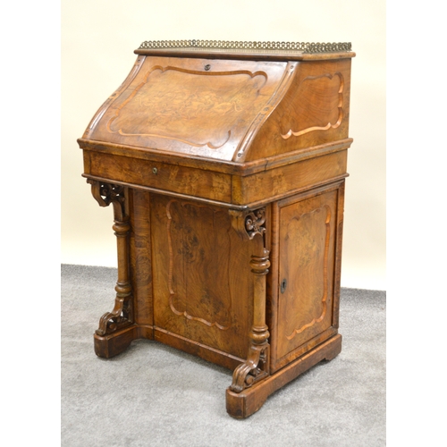 1828 - 19th Century walnut marquetry inlaid Davenport, the fall front enclosing a fitted interior above a s... 