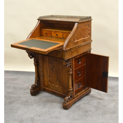 1828 - 19th Century walnut marquetry inlaid Davenport, the fall front enclosing a fitted interior above a s... 