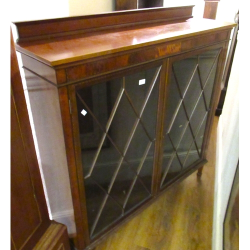 1871 - Edwardian inlaid two door bookcase having bar glazed doors with adjustable shelves on square taperin... 