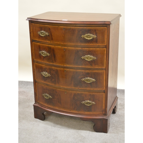 1883 - Edwardian mahogany satinwood banded bow front chest of four long drawers with cast brass handles rai... 