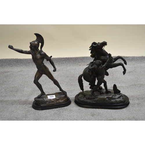1924 - Brown patinated spelter figure of a Greco Roman warrior (lacking weapon), together with a brown pati... 