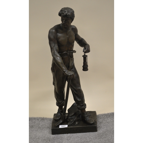 1927 - Bronze patinated spelter figure ' The Miner ' with pick axe and miners lamp, signed in the base E. P... 