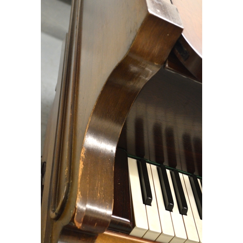 1933 - Julius Feurich of Leipzig, rosewood cased baby grand piano with ivory keys raised on turned fluted t... 