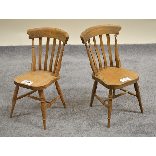 2019 - Pair of miniature oak Victorian style kitchen chairs on turned support with stretchers, 31cm high