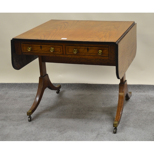 2104 - Recency elm and black line inlaid drop-leaf sofa table with two frieze drawers raised on rectangular... 