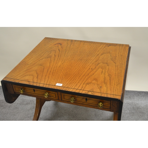 2104 - Recency elm and black line inlaid drop-leaf sofa table with two frieze drawers raised on rectangular... 