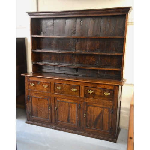 2113 - George III oak dresser with a boarded shelf back above three drawers and three cupboard doors, 200 x... 